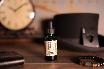 1oz green bottle Dark beard oil with dropper top