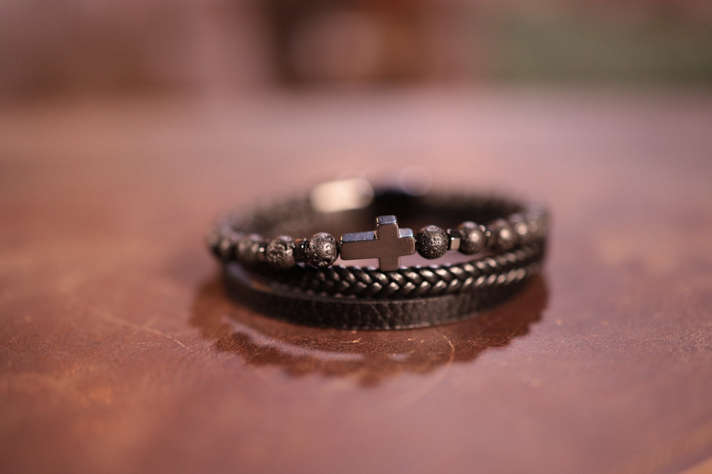 black triple band leather cross bracelet with lava stones and black cross magnetic clasp