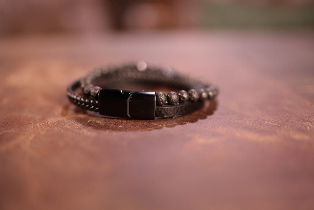 black triple band leather cross bracelet with lava stones and black cross magnetic clasp