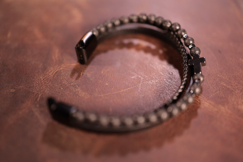 black triple band leather cross bracelet with lava stones and black cross magnetic clasp