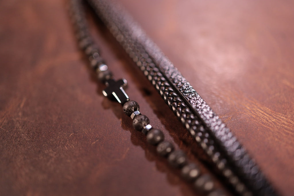 black triple band leather cross bracelet with lava stones and black cross magnetic clasp